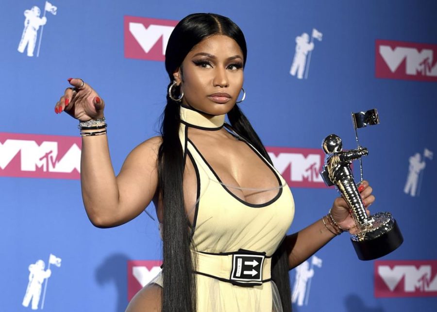 Nicki Minaj poses with her VMA award.