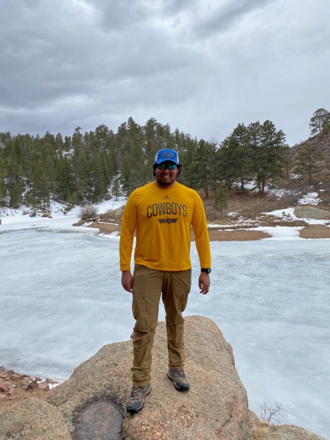 Cole Guerra stops for a picture during a hike in Wyoming. 