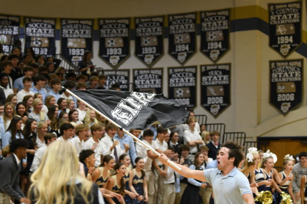 Senior Jake Sheely riles up the crowd at the recent Fall Sports Assembly